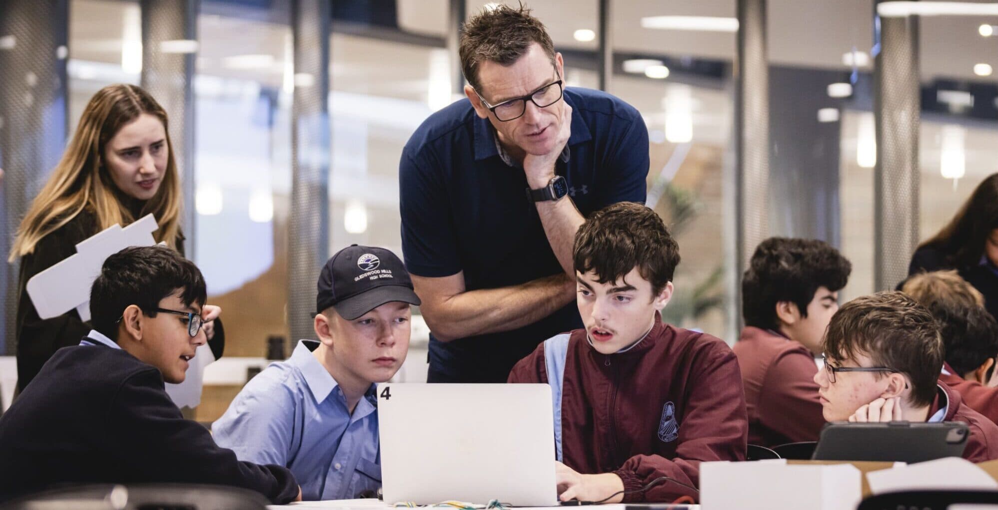 ABCN volunteer mentors with students