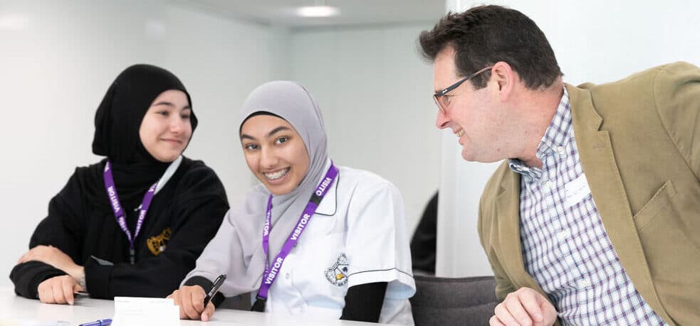 An ABCN mentor with two students